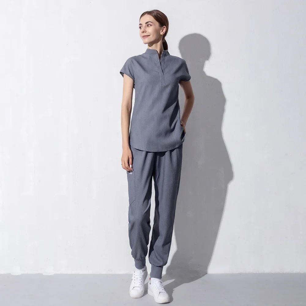 Scrubs Set for Women Pet Hospital Uniform Set Scrub Suits Solid Color Unisex Surgical Gown Pocket V-Neck Joggers Wholesale Price